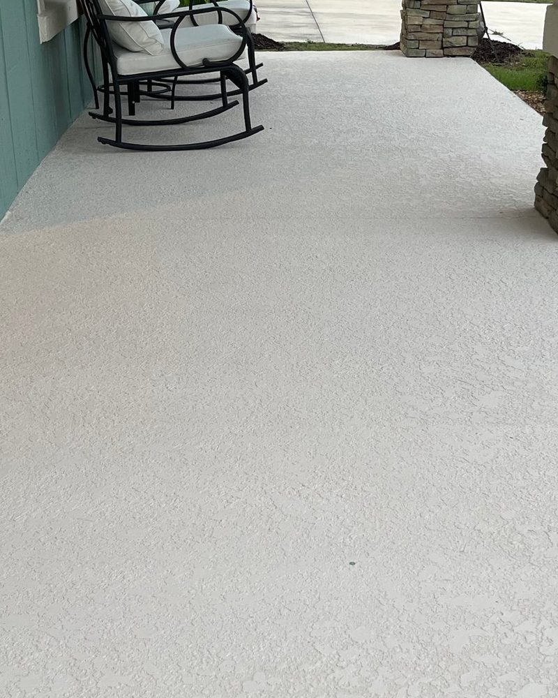 Front porch concrete after cleaning by H&S Home Services